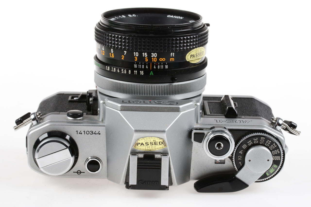 Canon AE-1 Gehäuse mit FD 50mm f/1,4 S.C. - #1410344