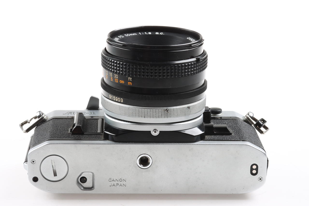 Canon AE-1 Gehäuse mit FD 50mm f/1,8 S.C. - #1386202