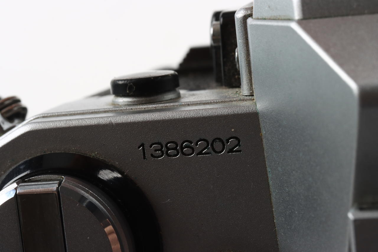 Canon AE-1 Gehäuse mit FD 50mm f/1,8 S.C. - #1386202