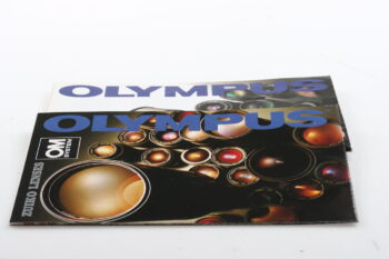 Olympus OM Objektivübersicht (En/De/Fr/Es)